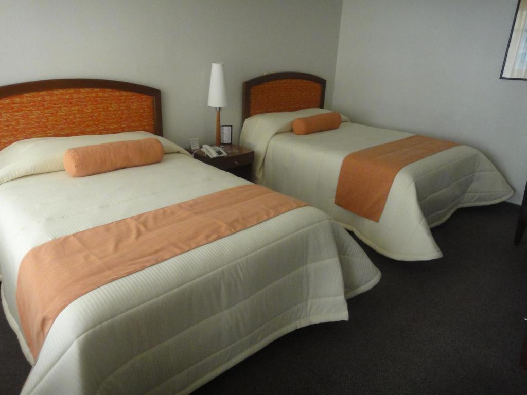 טולנסינגו Hotel Mediterraneo Sa De Cv חדר תמונה